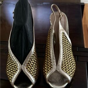 Two tons of gold sandals size 8